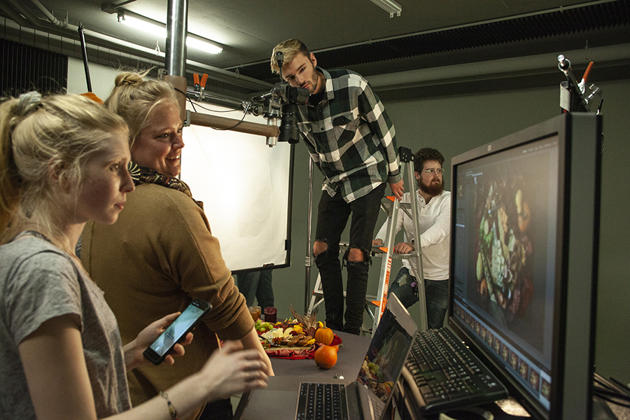 Students working in product photography class