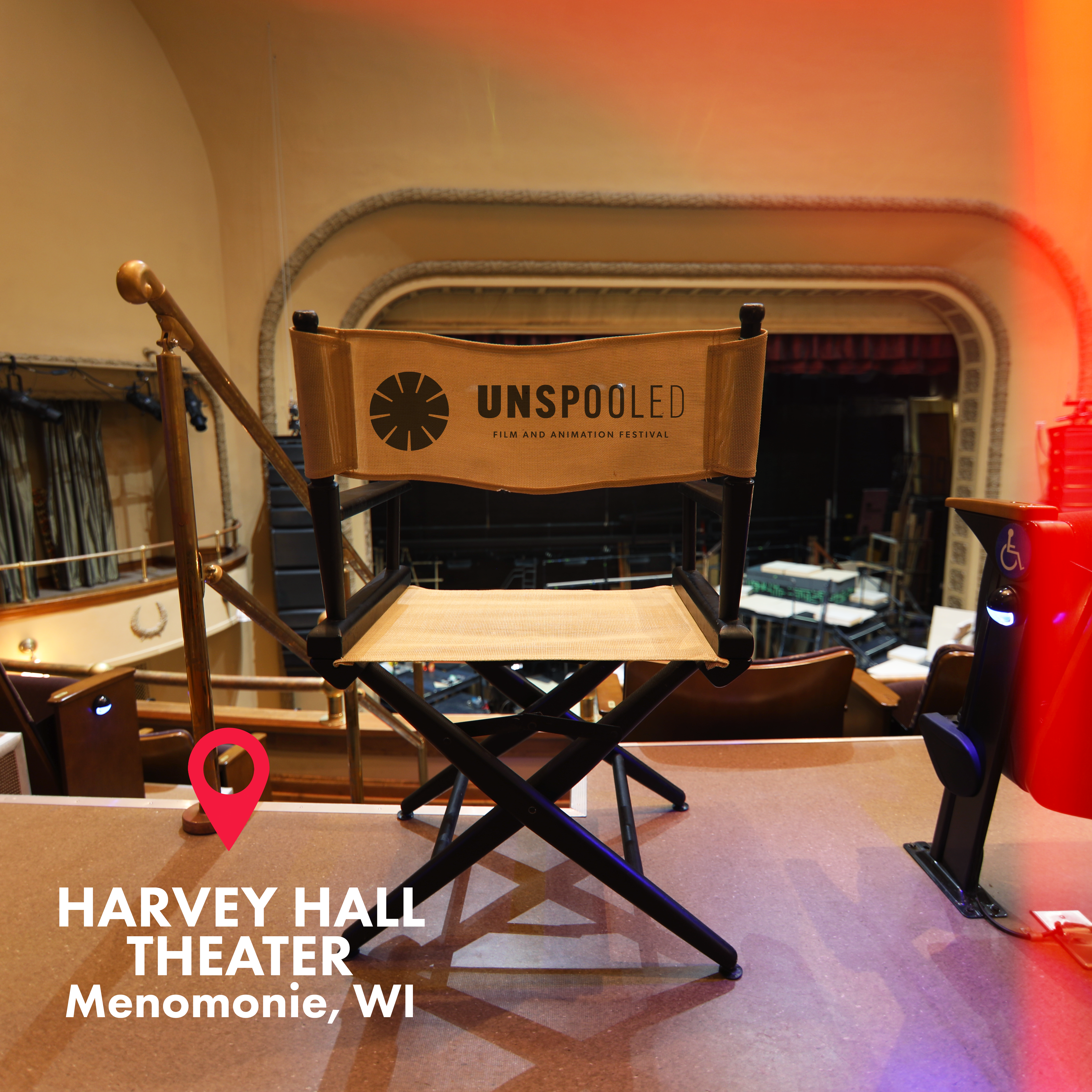 Direct Your Stay at Unspooled Film and Animation Festival - Directors chair sitting in Harvey Hall Theater at UW-Stout facing the stage