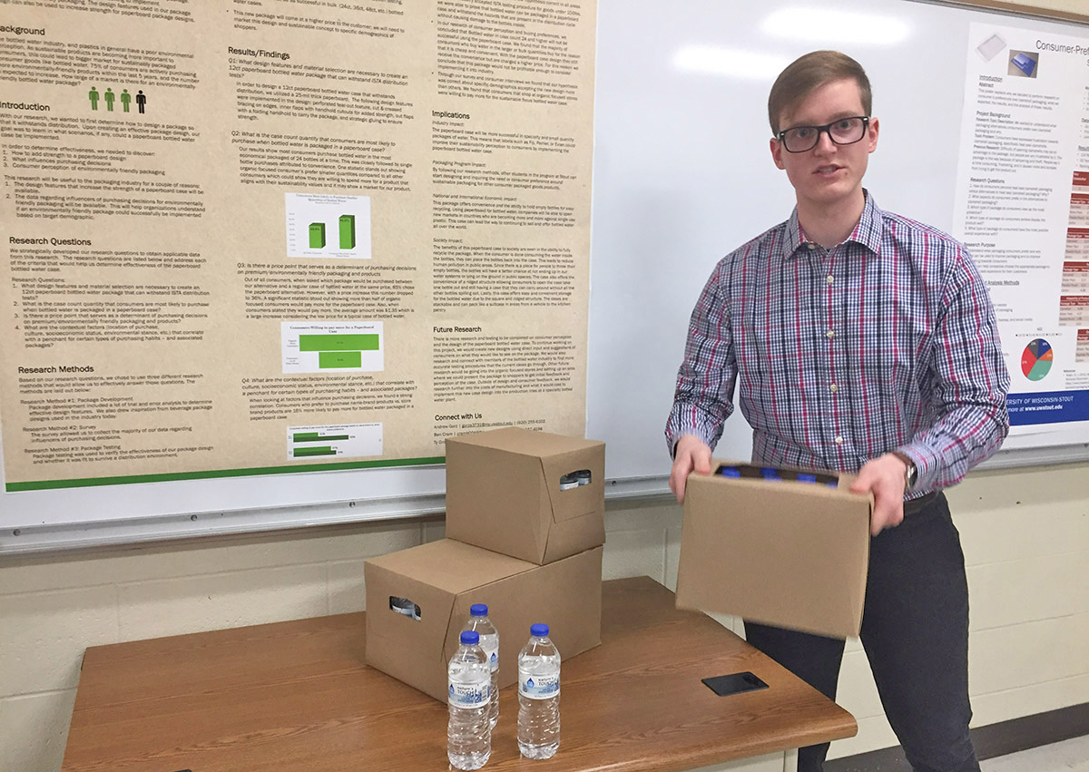 UW-Stout packaging student Ben Cram talks about a paperboard case for bottled water that appeals to upscale customers for its sustainability over plastic shrink wrap.