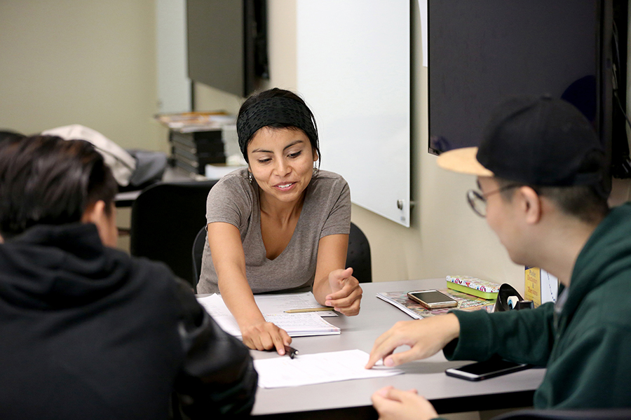 Clede Salinas Antezana of Peru works with other international students during a summer ESL class at UW-Stout.