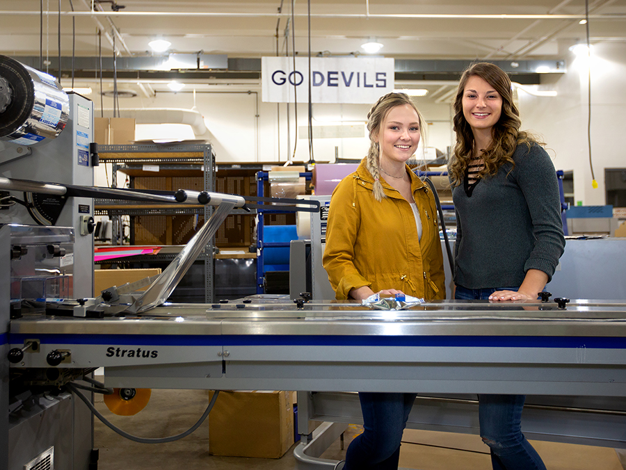 Packaging majors Maria Brownell, left, and Melea Bruns of UW-Stout took first place in a national design contest sponsored by the Flexible Packaging Association.