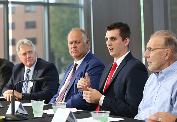 Student Harrison North, second from right, speaks at the news conference.