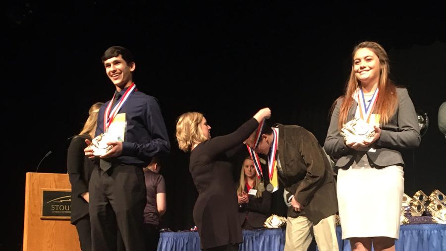 High school students receive awards at a recent DECA District I Career Development Conference at UW-Stout.