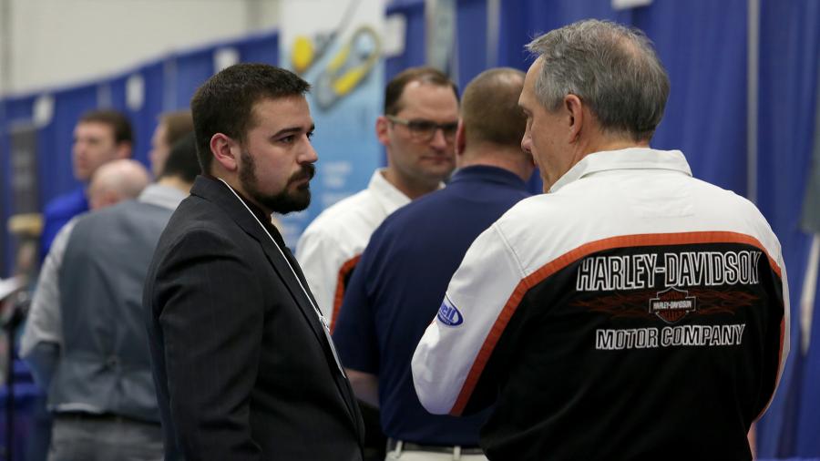 A Harley-Davidson recruiter speaks with a student at a past Career Conference at UW-Stout. 