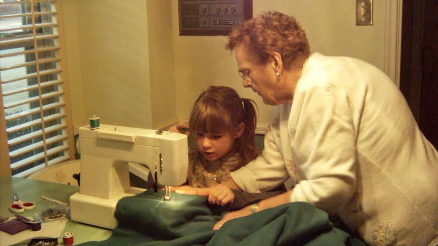 Jackie Miller and her grandma Carol, teaching her to sew.