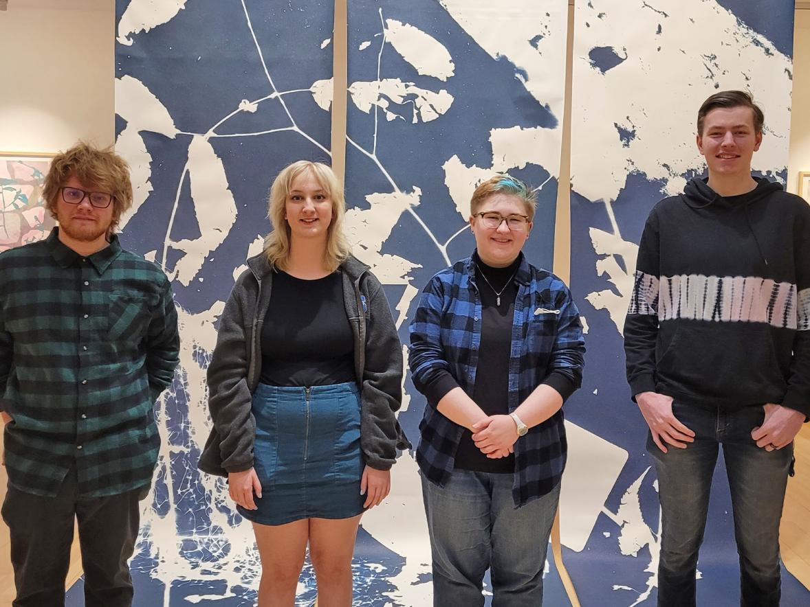 Mural designers, from left to right, Jack Gilbert, Amelia Moschkau, Bree Marconnet and Tommy Slane