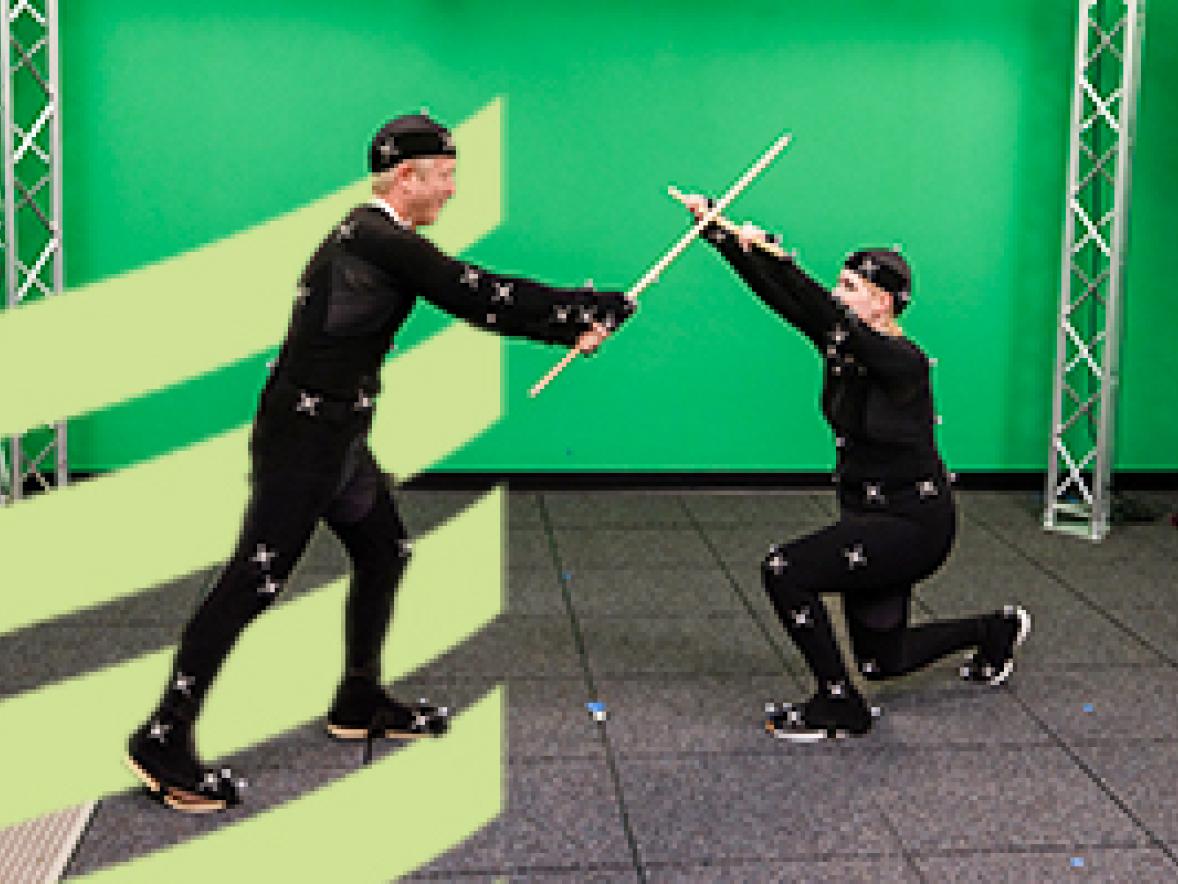 Students engage in the motion capture studio lab space.