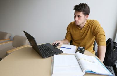 An engineering student works on mathematics coursework in Jarvis Hall.