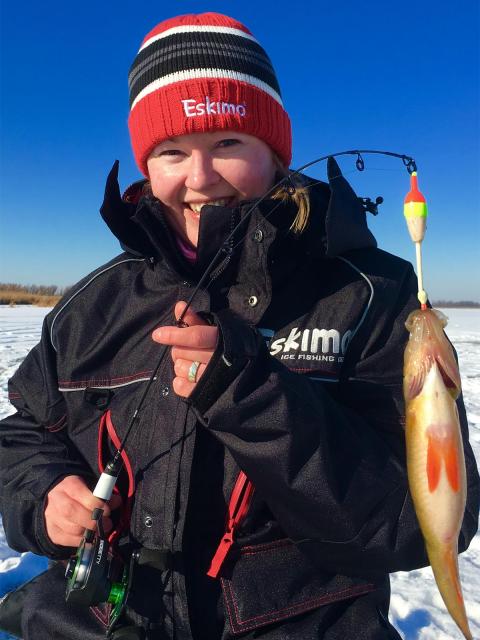 Sara Goodman with a perch out on the ice. Photo by Ardisam, Inc.